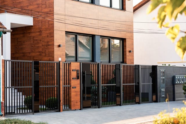 Modern residential electric gate, showcasing the benefits of installing electric gates to improve security and privacy at home.
