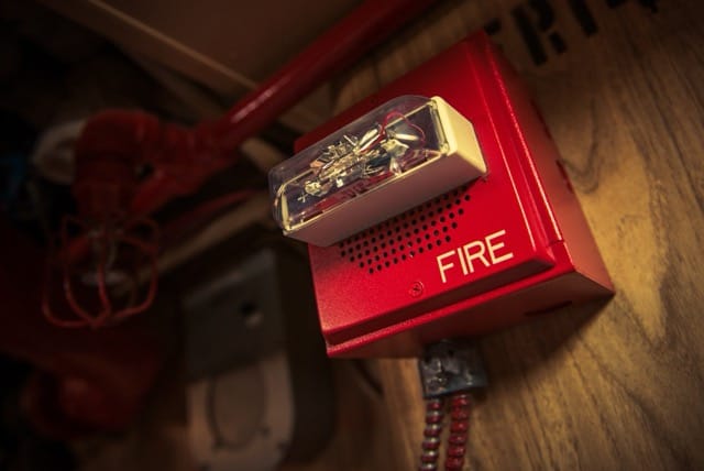 Why Do Your Fire Alarms Keep Going Off- a fire alarm is showing in home and it represent keep off.