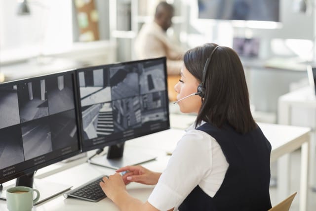 CCTV Installer Hiring Guide: a women expert cctv installer setting cctv in home.